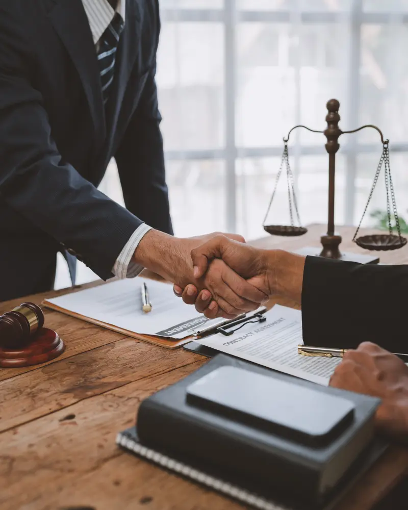 lawyers-join-hands-with-business-people-to-sign-a-2025-02-19-20-51-23-utc